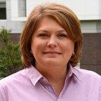 Assistant Professor of Nursing Doreen Rogers outside.